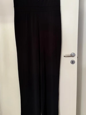Jumpsuit / playsuit  - Storlek XL. Aldrig använd. 