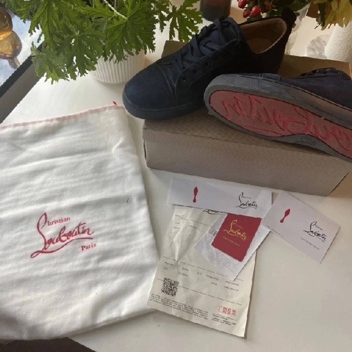 Christan Louboutin  - 90