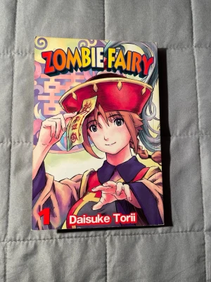 Zombie Fairy - En galen och rolig manga om en 600-årig zombie-tjej som plötsligt dyker upp i en modern familj. Full av action, humor och övernaturliga äventyr – perfekt för dig som gillar tokiga berättelser och manga med fantasyinslag!