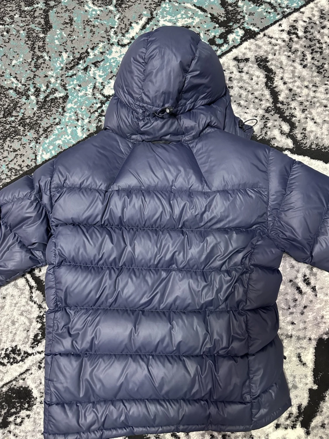 Mörkblå Peak Performance dunjacka - 2