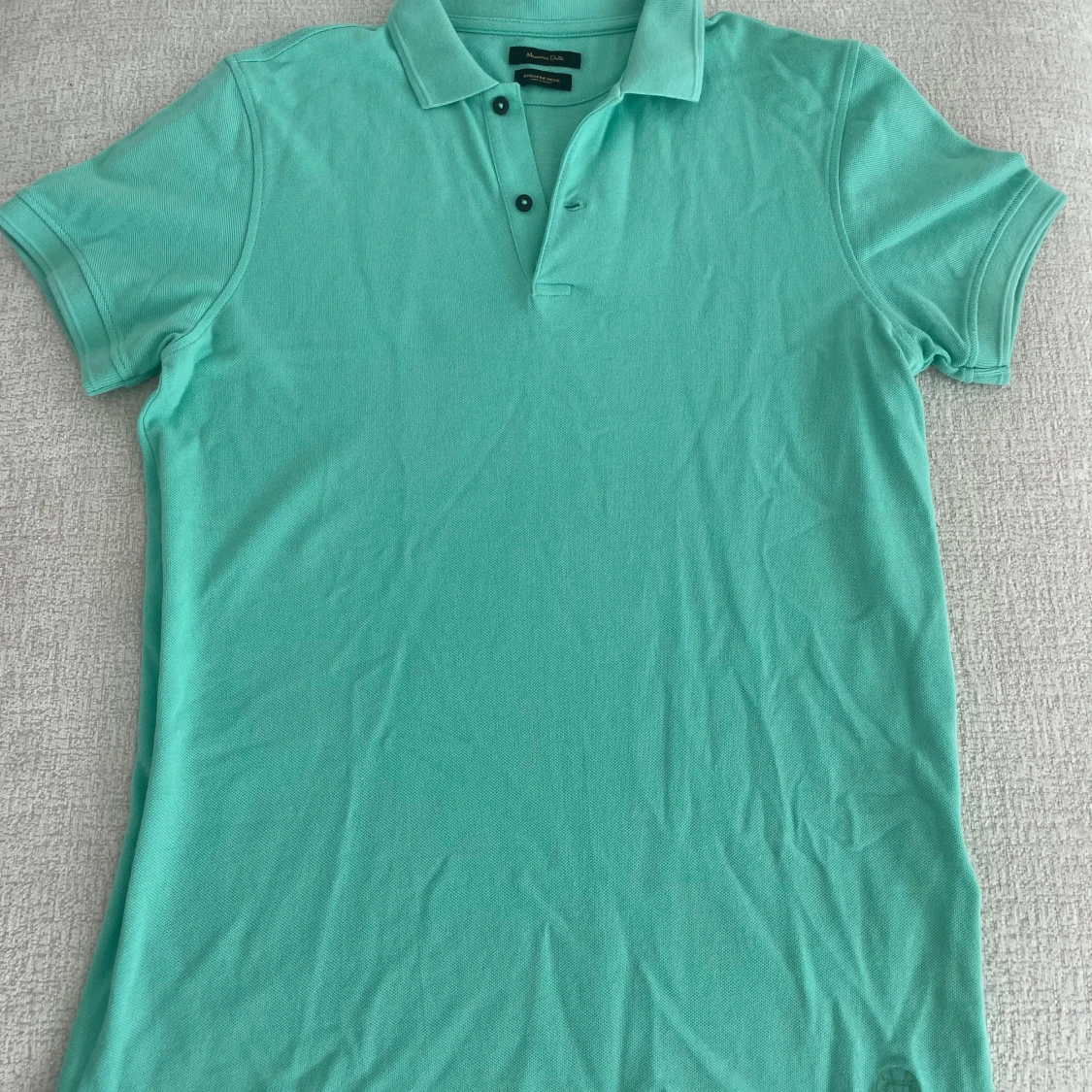 Turkos pikétröja från Massimo Dutti