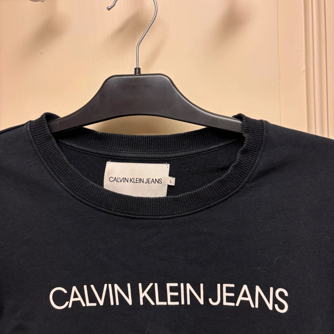 Svart sweatshirt från Calvin Klein Jeans Stl L - 1