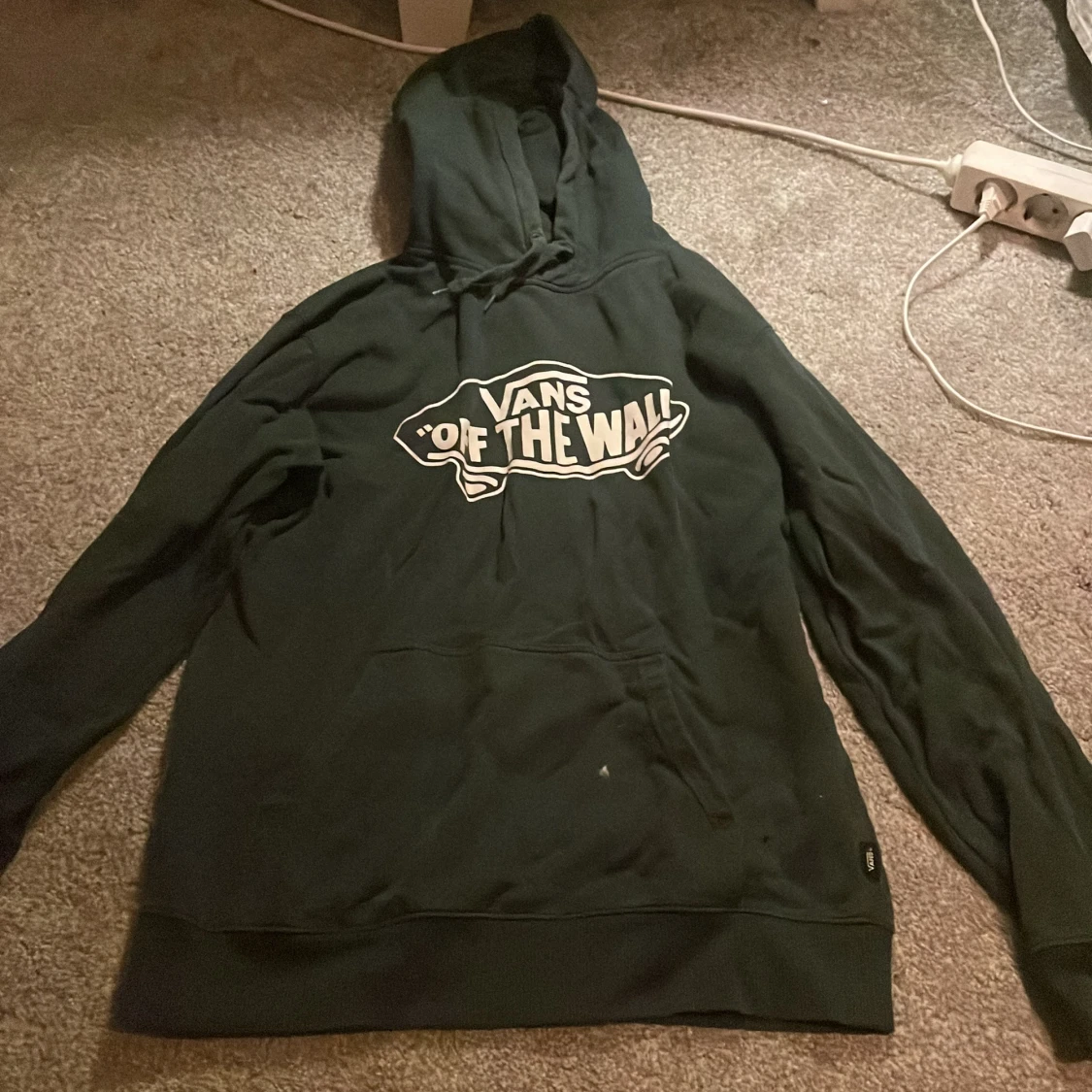 Mörk grön hoodie från Vans med tryck