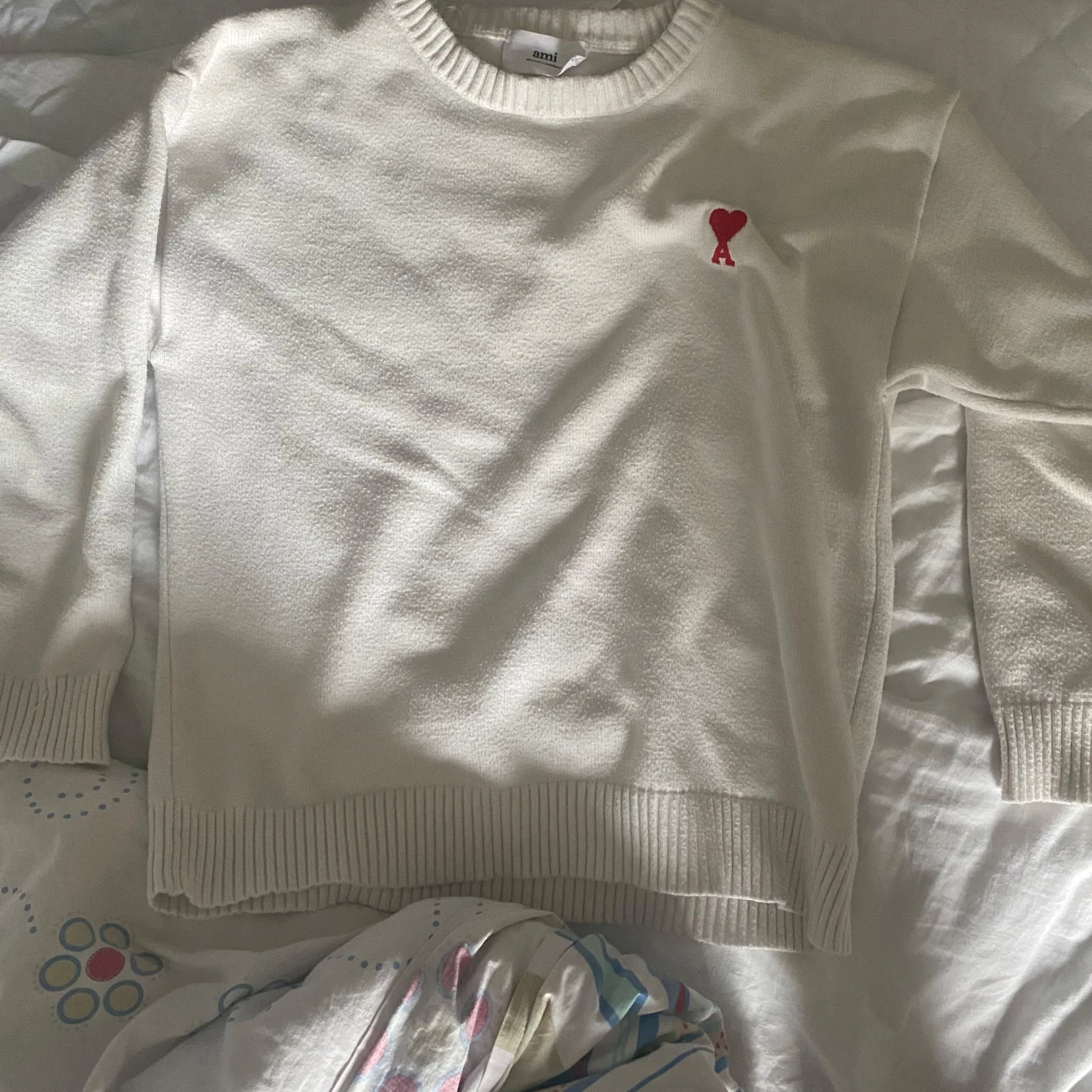 Vit stickad tröja från Ami