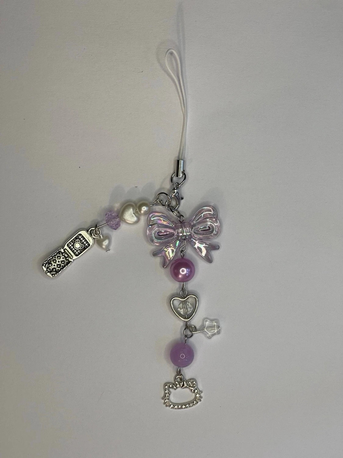 Lila Hello Kitty Mobil Slinga đ