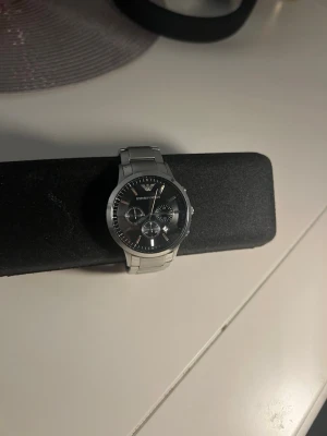 Armani Klocka  - Bra skick på klockan , funkar perfekt , utan orginel box 