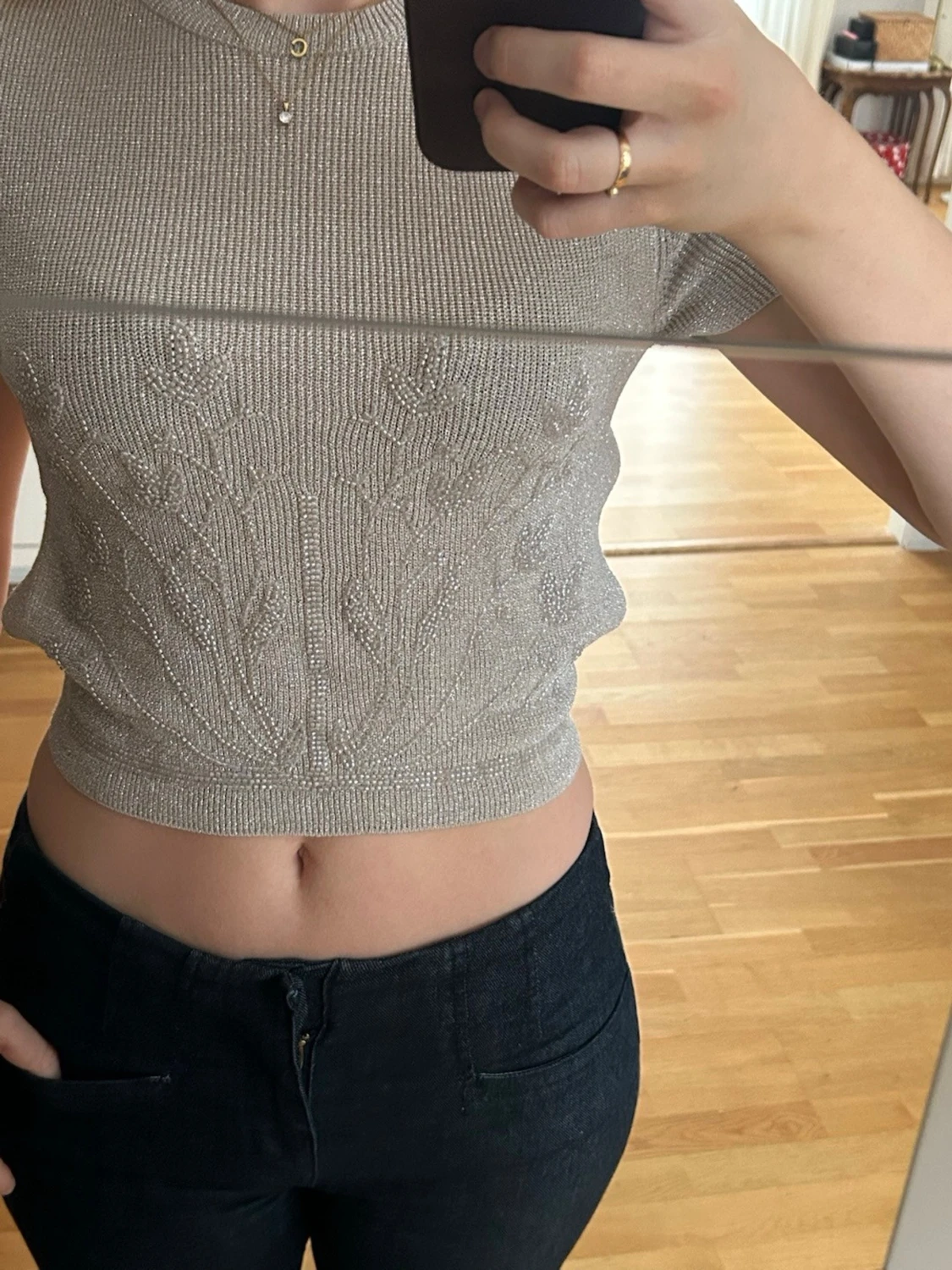 Glittrig croppad topp med öppen rygg - 1