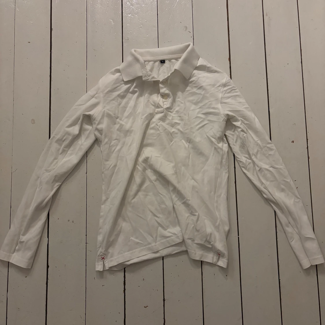 Vit långärmad pikétröja