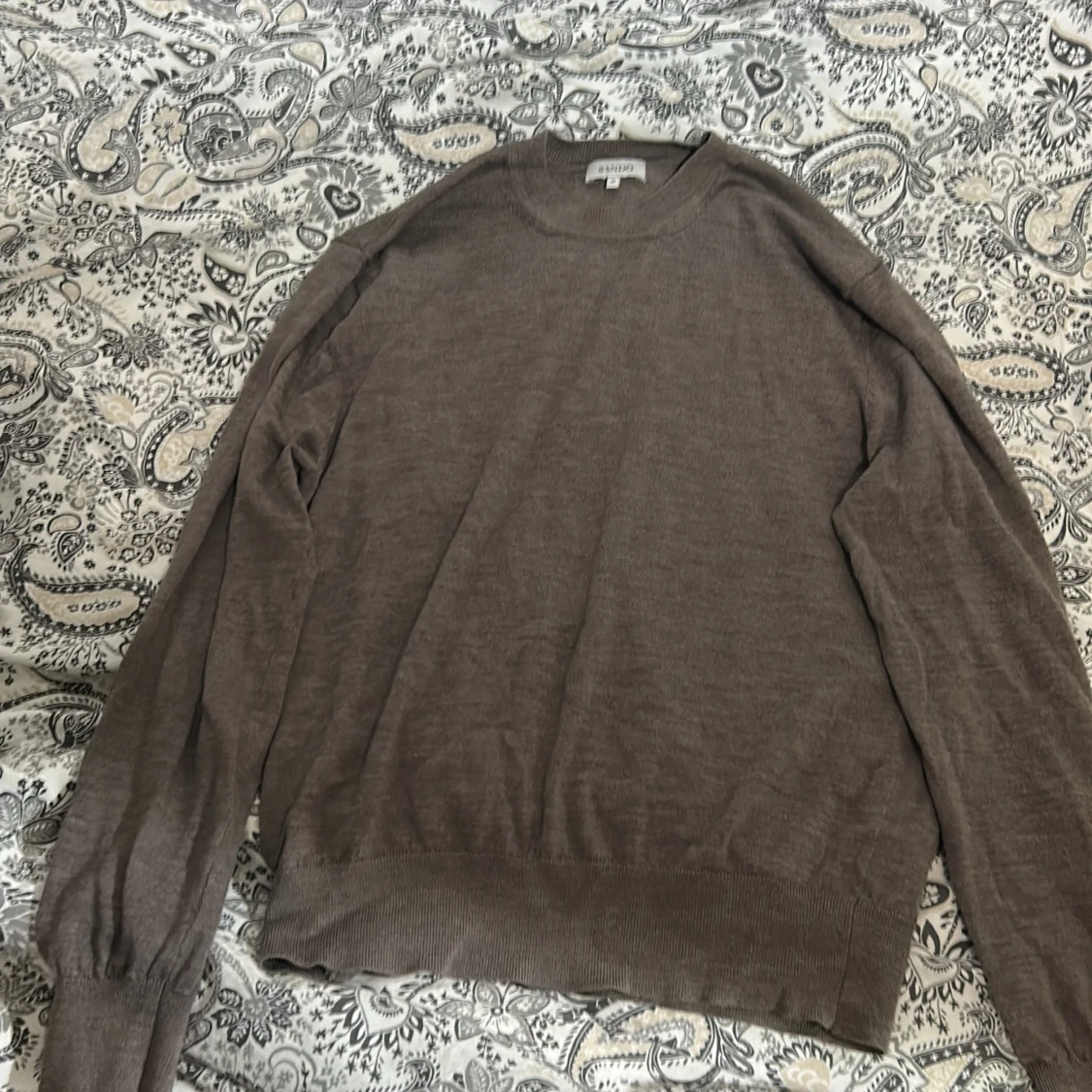 Brun stickad tröja från Sandö