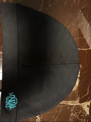 Syna world beanie - Helt ny