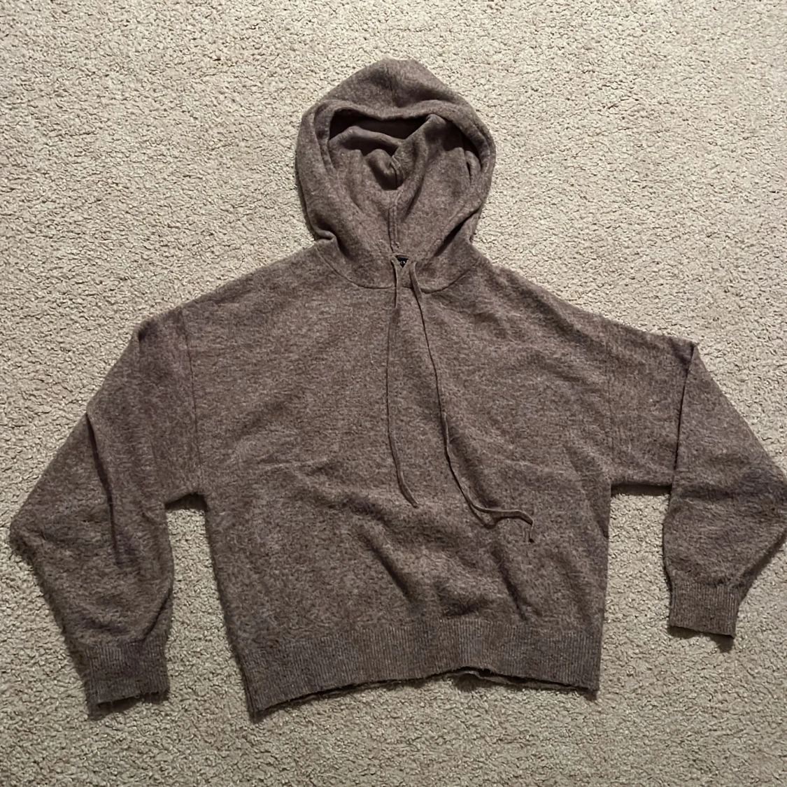 Beige stickad hoodie från Lindex XS