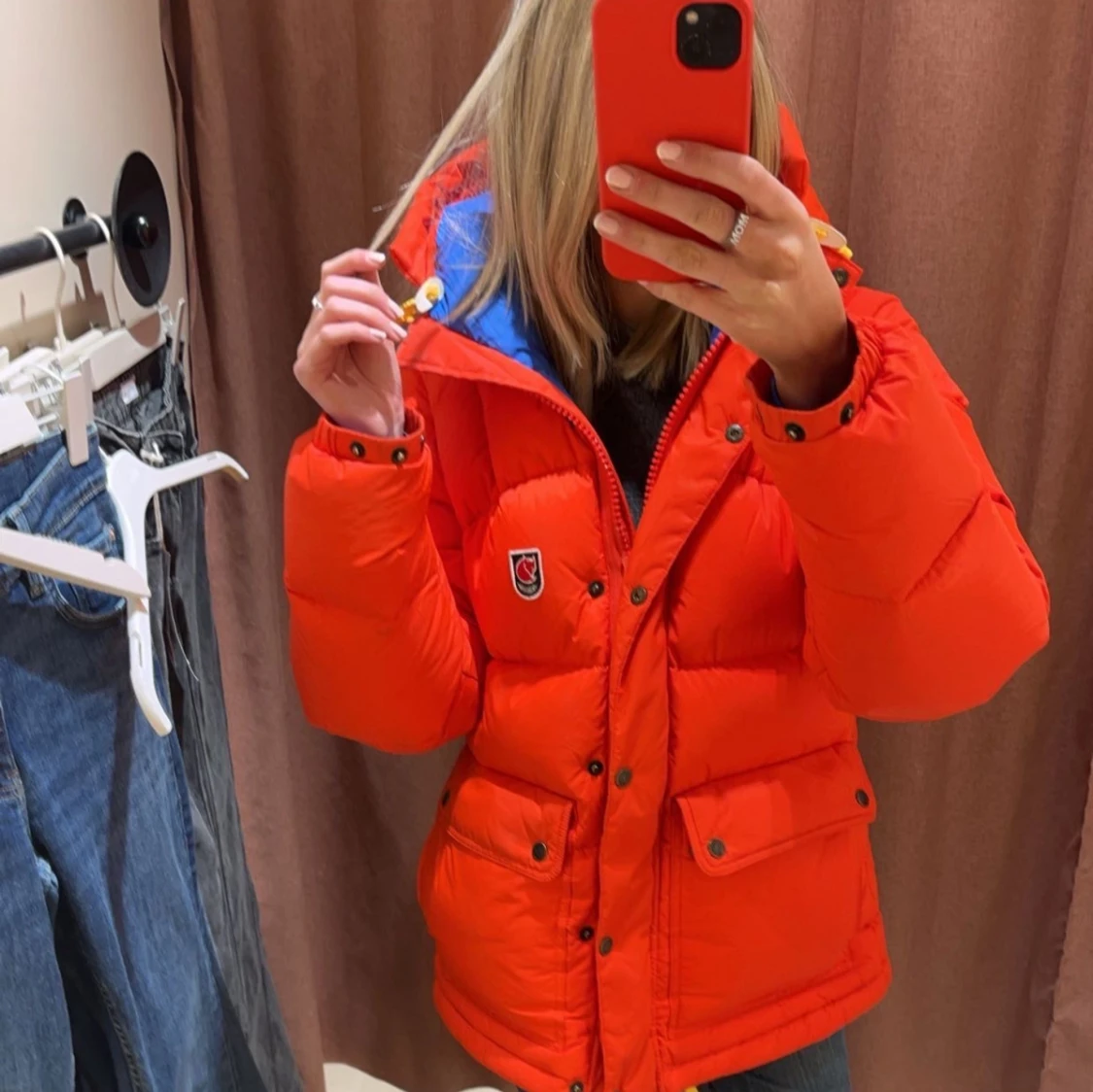 Röd dunjacka från Fjällräven