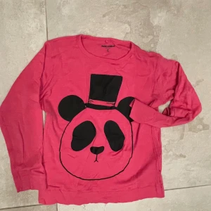 Rosa långärmad tröja Mini Rodini - Rosa  långärmad tröja från Mini Rodini. 100% ull. 