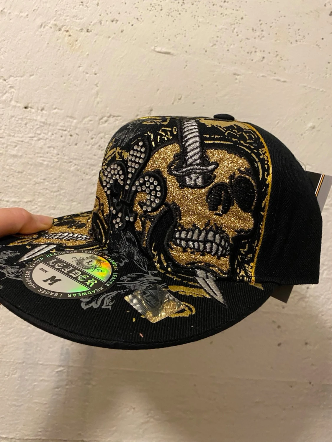 Svart och guld glittrig keps Leader - 1
