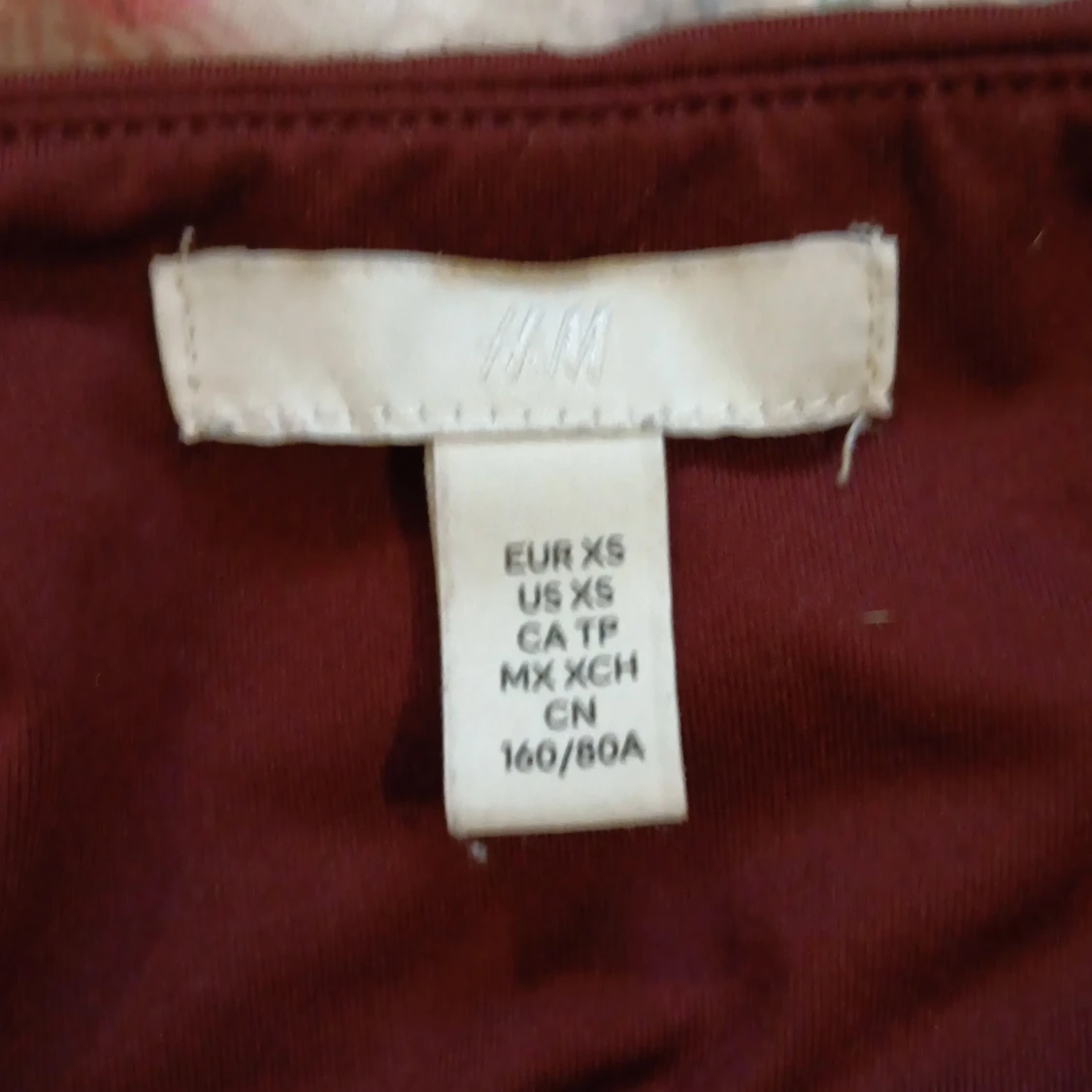 Vinröd långärmad body från H&M - 2