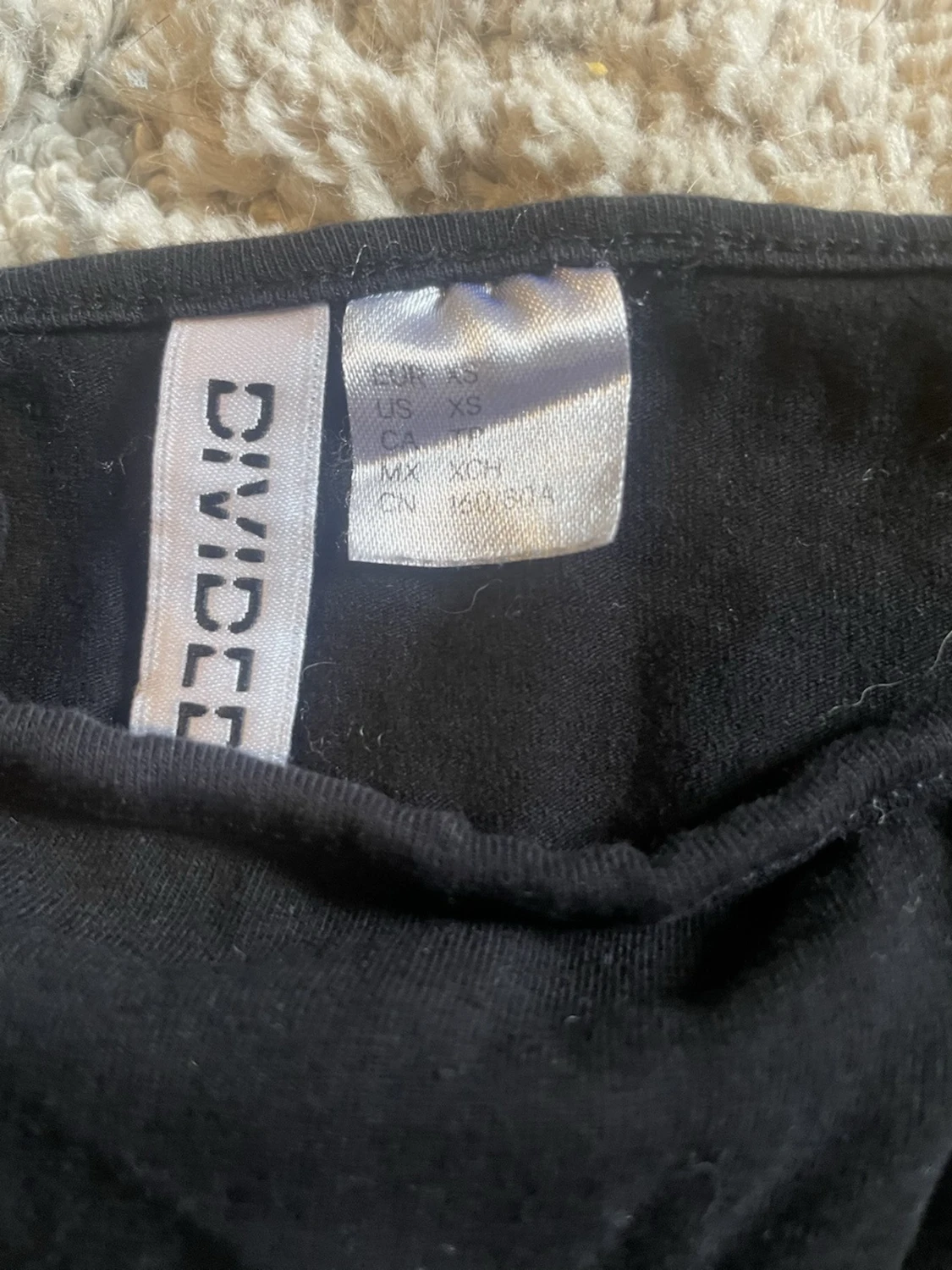 Svart linnetopp från Divided XS - 1