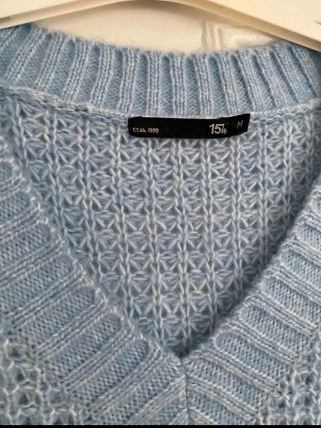 Ljusblå stickad tröja från 157 - 1
