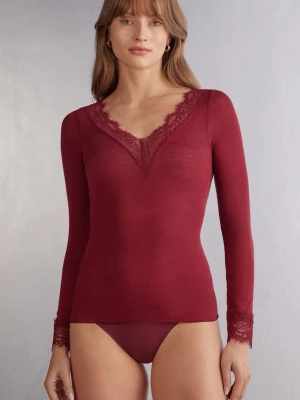Vinröd långärmad topp med spets Intimissimi  - Supersnygg vinröd långärmad topp med v-ringning och spetsdetaljer från Intimissimi! Inga defekter alls, använd 2 gånger. 