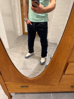 Replay jeans  - Ett par snygga byxor från Replay i storlek W34 L34 i modellen Anbbas 