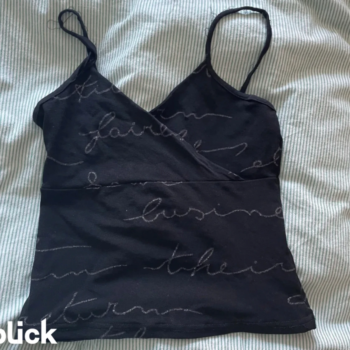 Svart glittrigt linne 