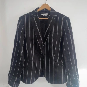 Kavaj - En fin kavaj som blivit använd några gånger