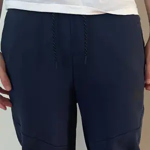 Nike tech fleece blå mjukisbyxor 