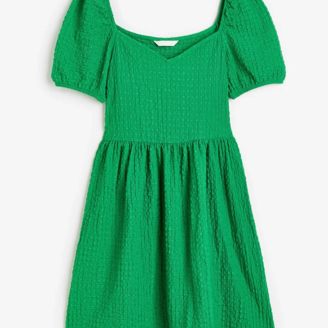 Struktur mönstrad trikåklänning med puffärm