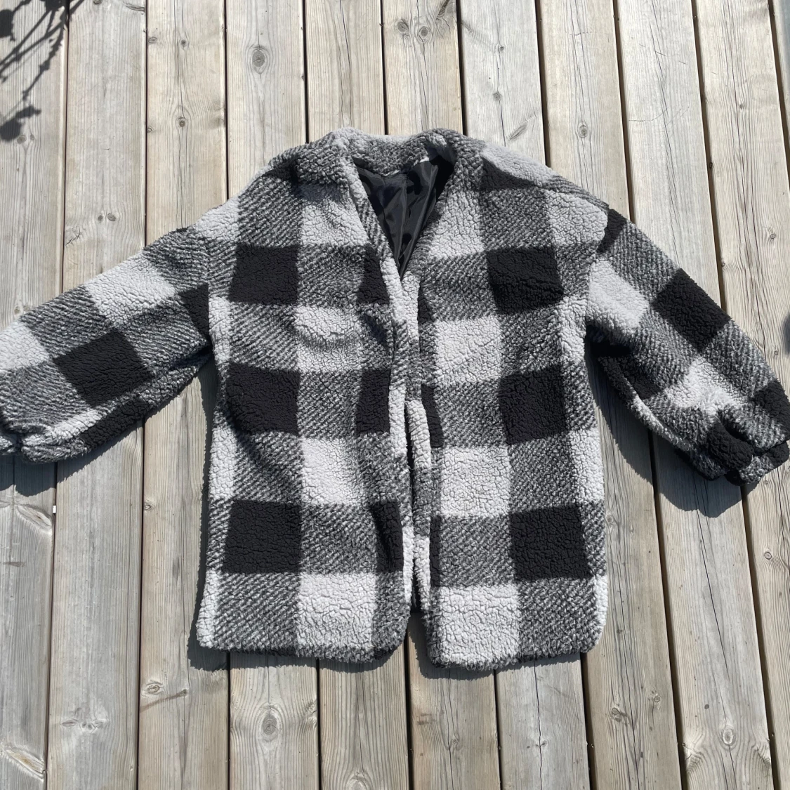 Svart vit rutig höstjacka