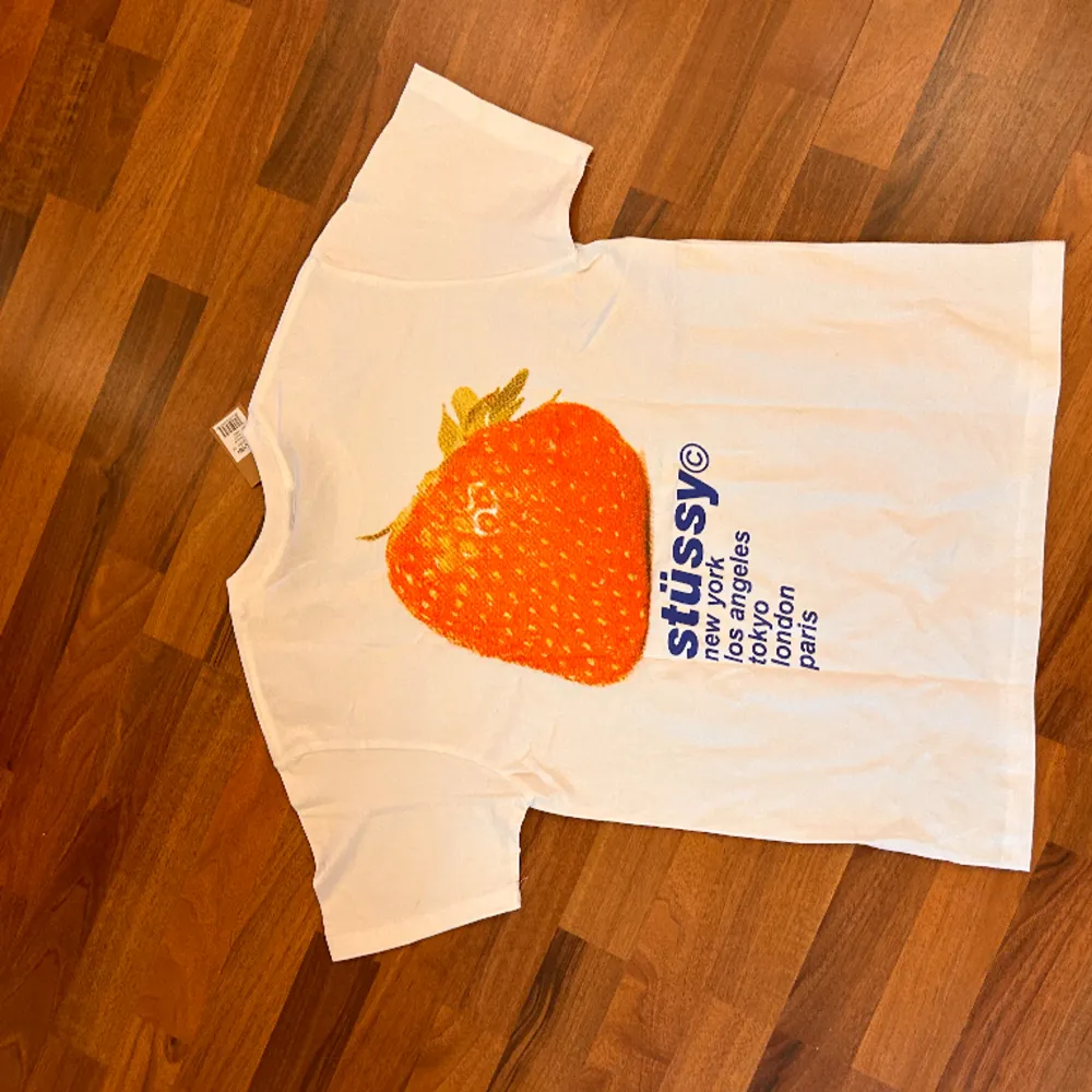 brand new stussy strawberry tee. T-shirts.