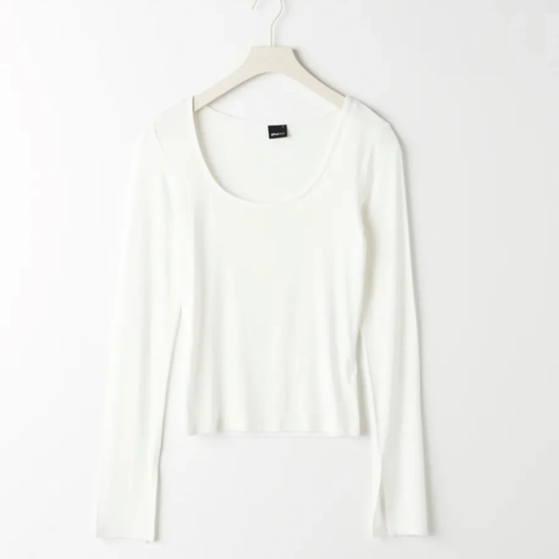 Långarmad tröja med slits