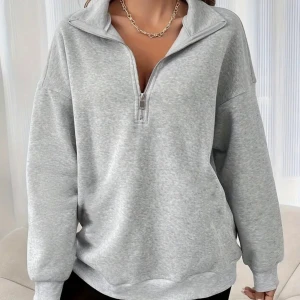 Grå tröja  - Helt ny och oanvänd