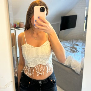 Topp - Står ej storlek men skulle säga att den är som en xs