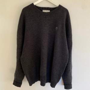 Cotton/wool blend oversized knit from Acne Studios. Comes with a nice embroidered logo. Fits very oversized. Fits L-XL.