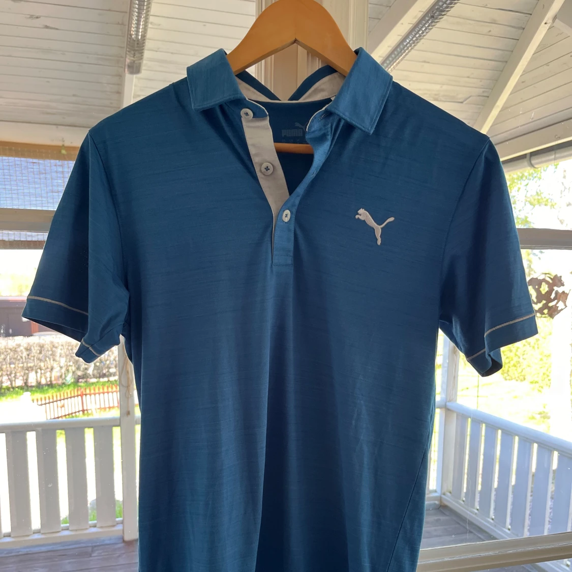 Blå puma polo