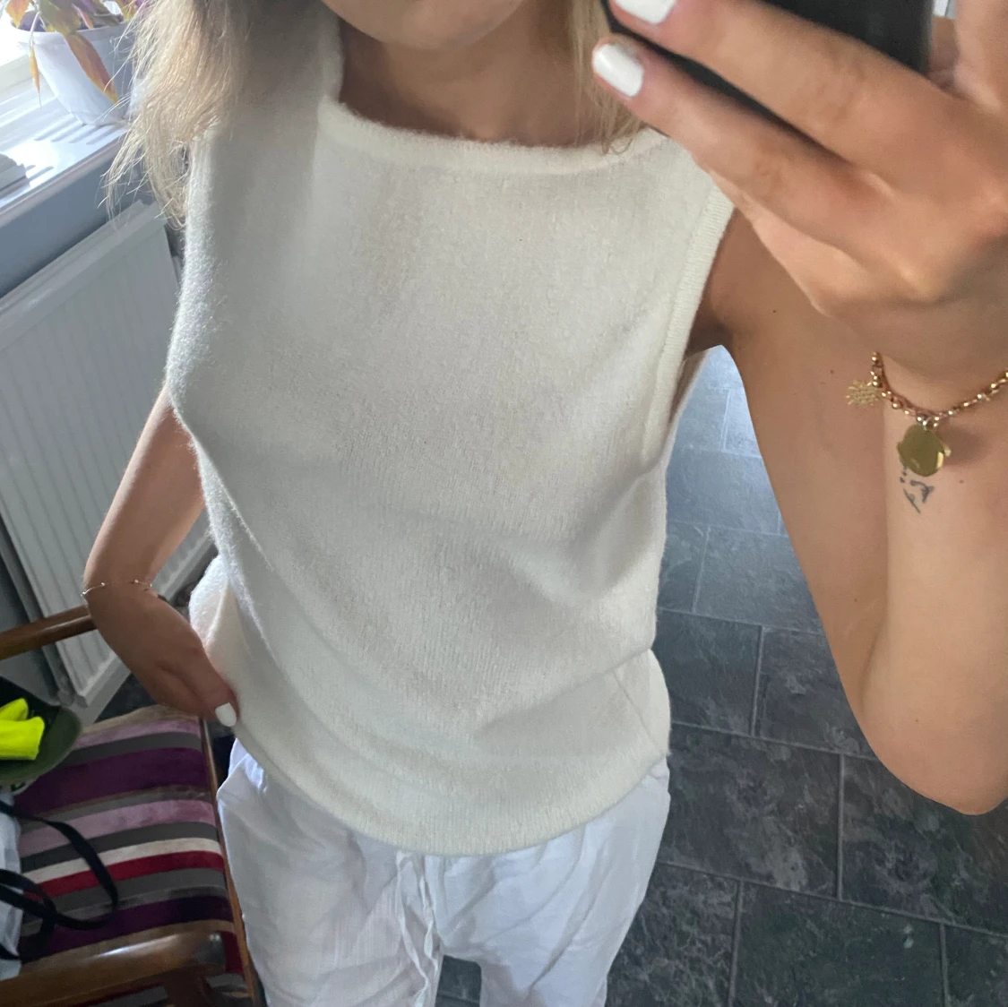 Stickad linneliknande topp