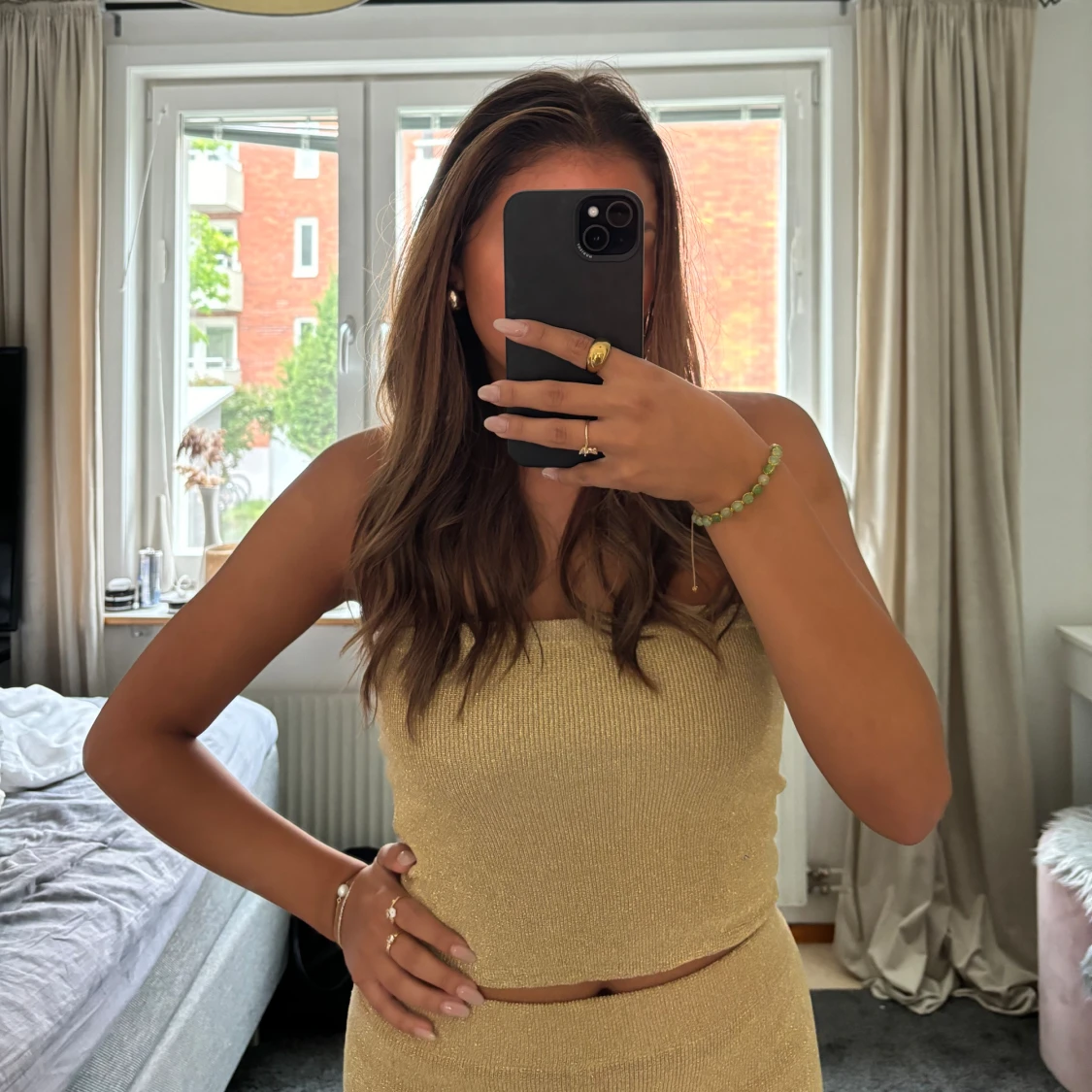 Guldig topp från Gina tricot - 90