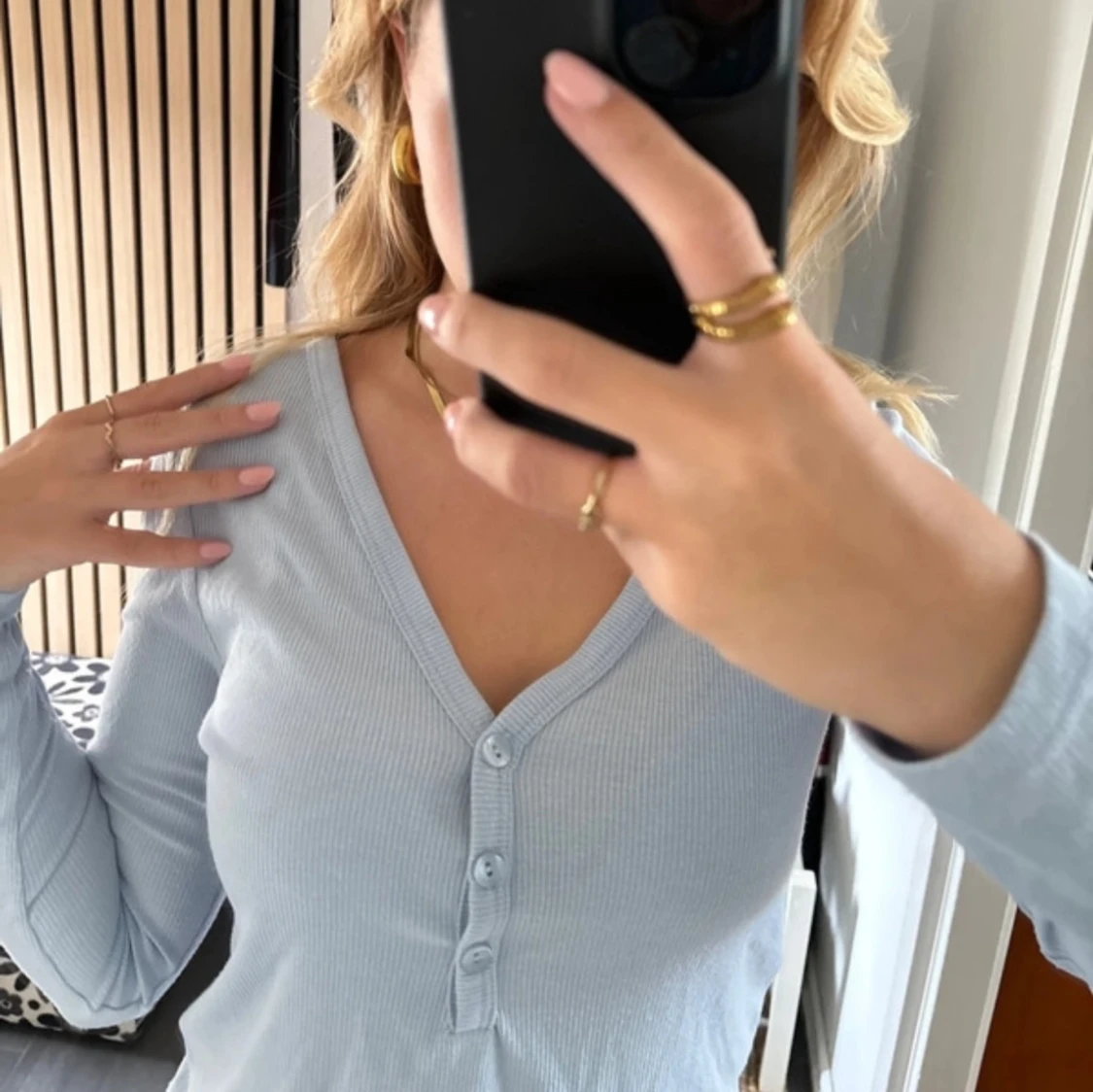 Ljusblå tröja  - 91