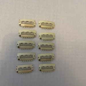 Löshårs clips  - 10 st clips som du sätter fast på ditt löshår. Mycket bra skick då det används enstaka gånger. 