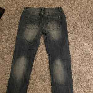 Straight jeans - Jeans med coola bakfickor. Knappt använda. W26 L30
