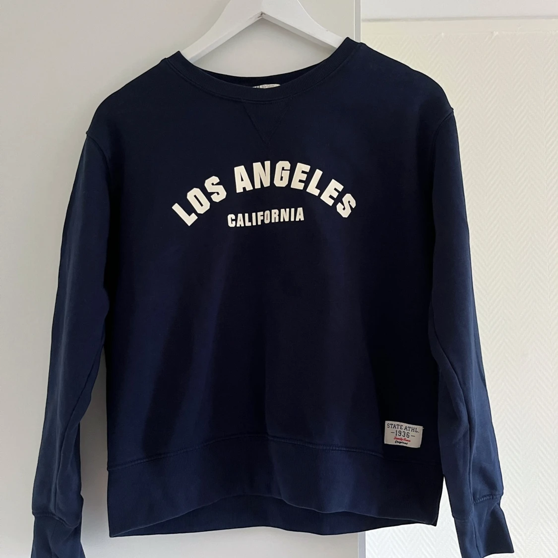 H&M collegetröja blå 