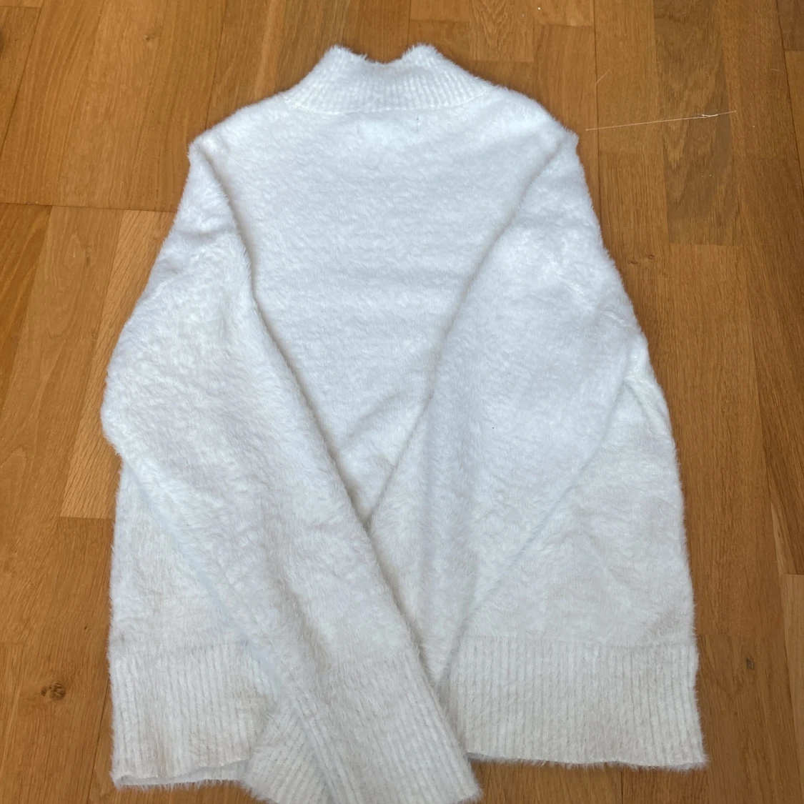 Vit mysig polotröja