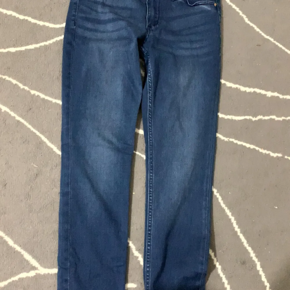 Ett par skinny fit jeans, EUR-152. Jeans & Byxor.