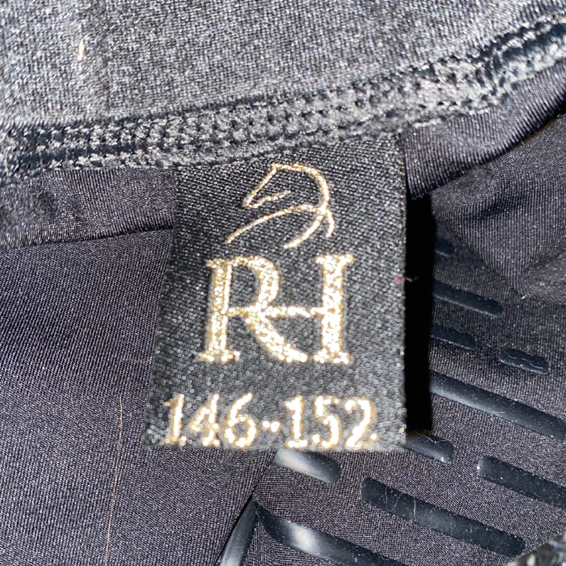 Grå,svarta ridbyxor  - 91