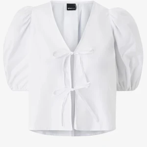 Blus  - Använd en gång, som ny. 