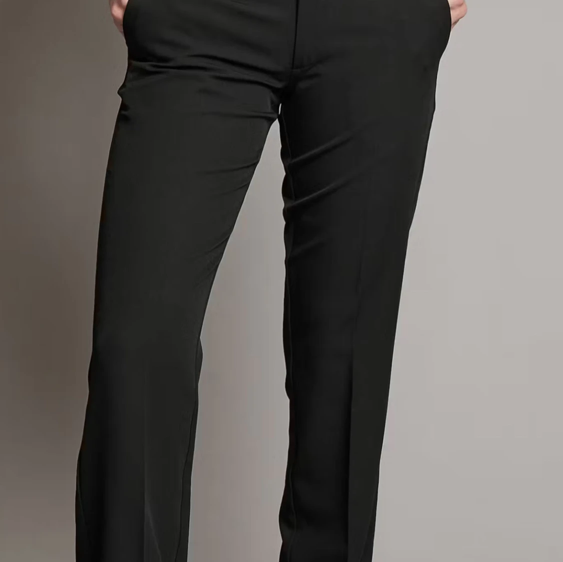 Svarta kostymbyxor