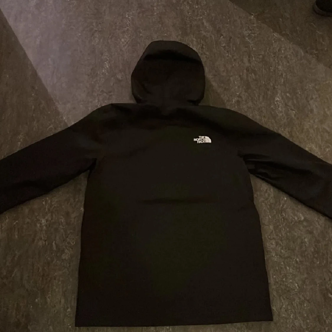 Svart vindjacka från The North Face