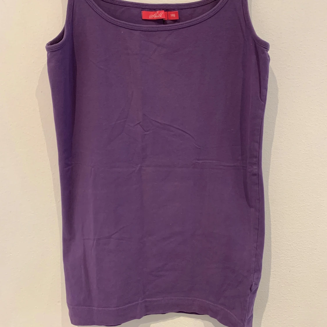 Lila linnetopp från Shell