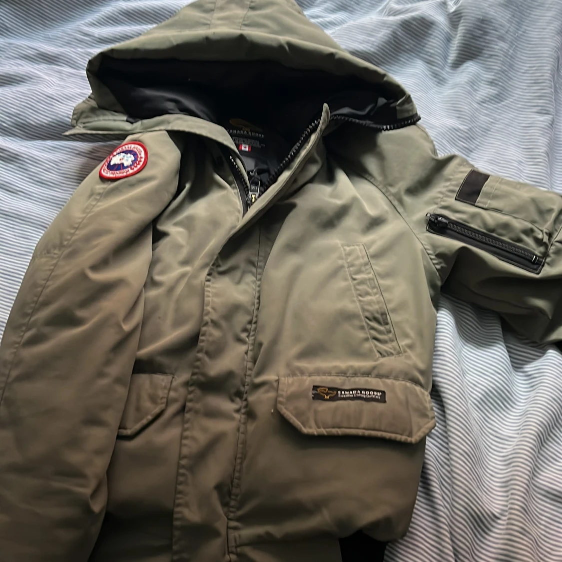 Grön dunjacka från Canada Goose