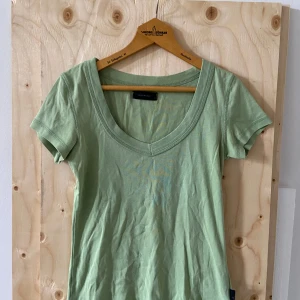 Ljusgrön T-shirt - Fint skick