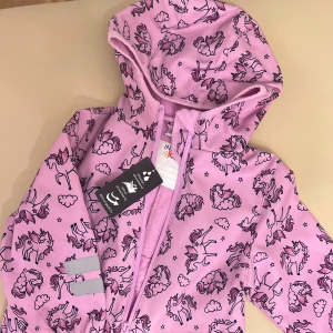 Rosa barn overall  - Storlek 92/98 oanvänd 
